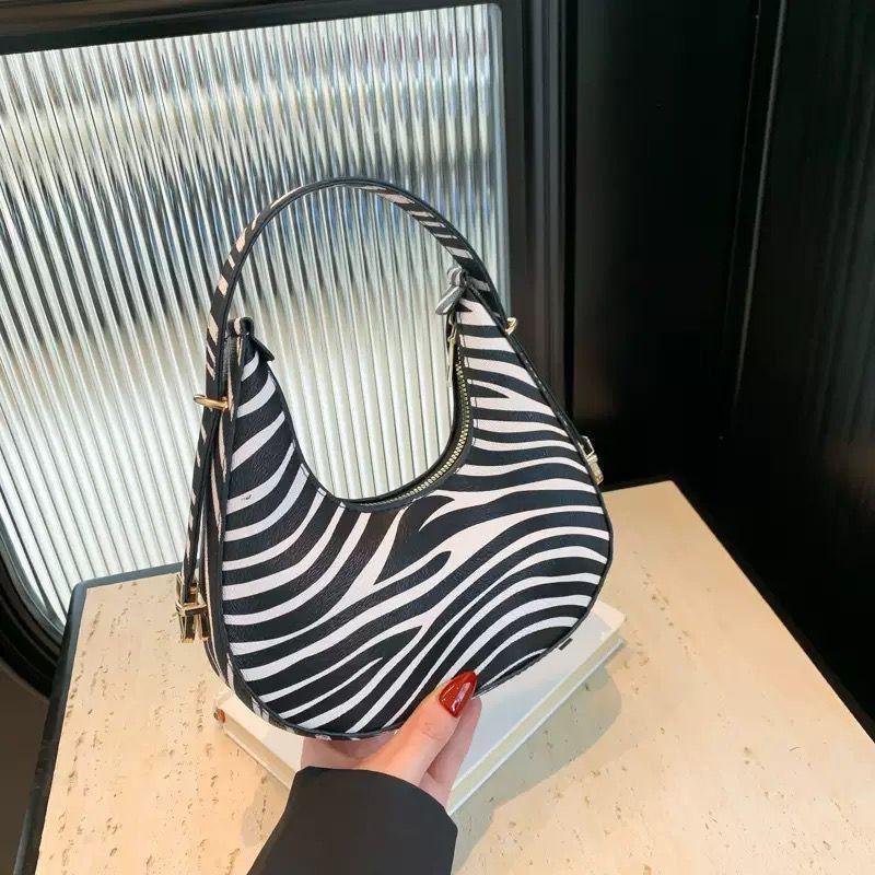 Zebra Print Crescent Shoulder Bag